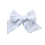 Jumbo Pinwheel Bow - White Seersucker | Nashville Bow Co. - Classic Hair Bows, Bow Ties, Basket Bows, Pacifier Clips, Wreath Sashes, Swaddle Bows. Classic Southern Charm.