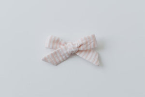New Girl Bow - Peach Seersucker | Nashville Bow Co. - Classic Hair Bows, Bow Ties, Basket Bows, Pacifier Clips, Wreath Sashes, Swaddle Bows. Classic Southern Charm.