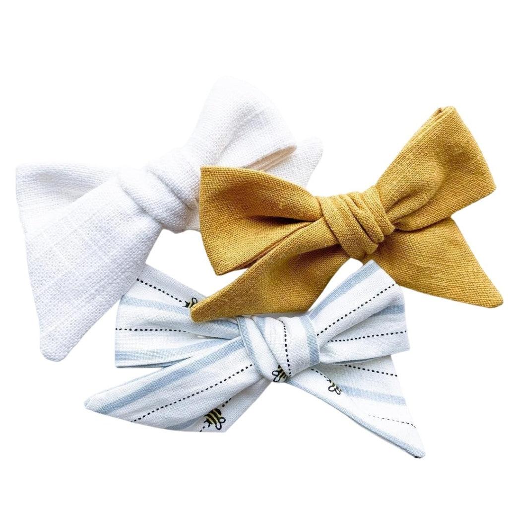 Pinwheel Bow - Milk | Nashville Bow Co. - Classic Hair Bows, Bow Ties, Basket Bows, Pacifier Clips, Wreath Sashes, Swaddle Bows. Classic Southern Charm.