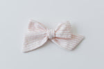 Pinwheel Bow - Peach Seersucker | Nashville Bow Co. - Classic Hair Bows, Bow Ties, Basket Bows, Pacifier Clips, Wreath Sashes, Swaddle Bows. Classic Southern Charm.