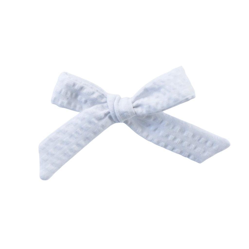 Schoolgirl Bow - White Seersucker | Nashville Bow Co. - Classic Hair Bows, Bow Ties, Basket Bows, Pacifier Clips, Wreath Sashes, Swaddle Bows. Classic Southern Charm.